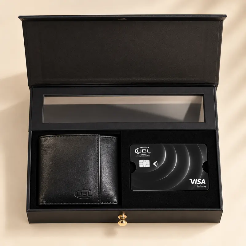 Presentation box with window lid open at an angle, showing individually sized wells
