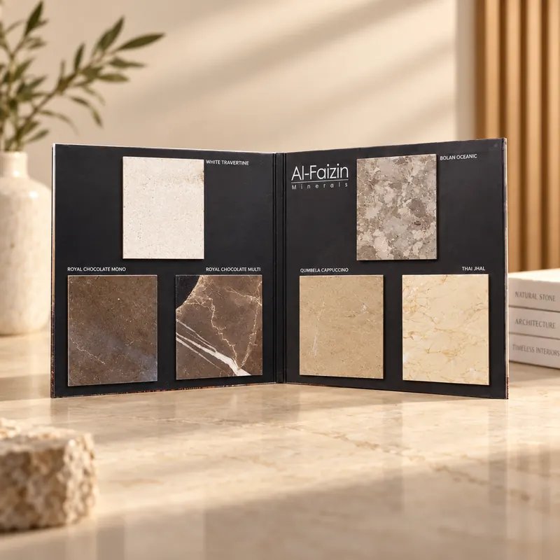 Stone sample book standing open on a counter with six tiles mounted